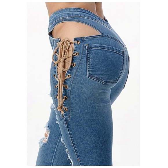 Distressed Denim jean with side tie. - Picture 2 of 3